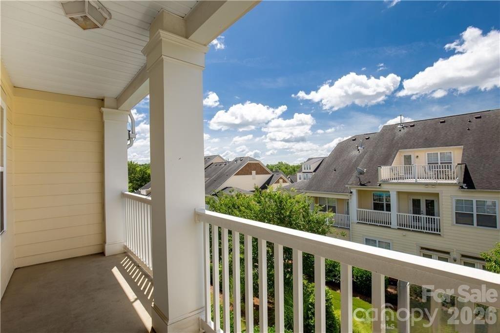 114 Inlet Point Drive Tega Cay, SC 29708 - Photo 18 of 40 a view of a balcony with lake view