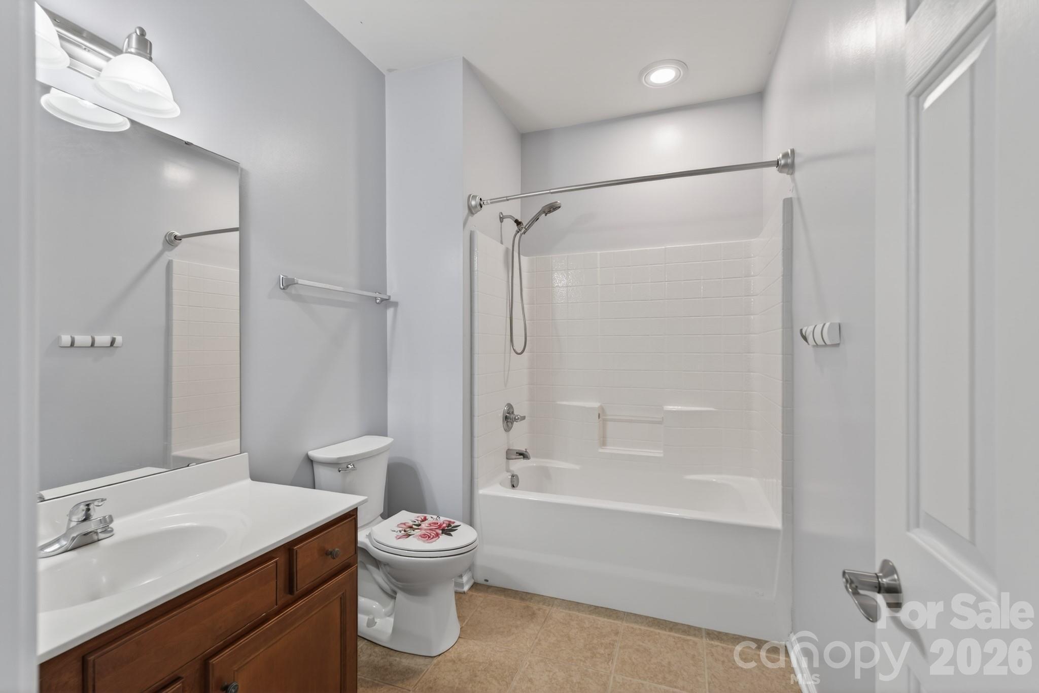 114 Inlet Point Drive Tega Cay, SC 29708 - Photo 23 of 40 a bathroom with a sink toilet tub and shower