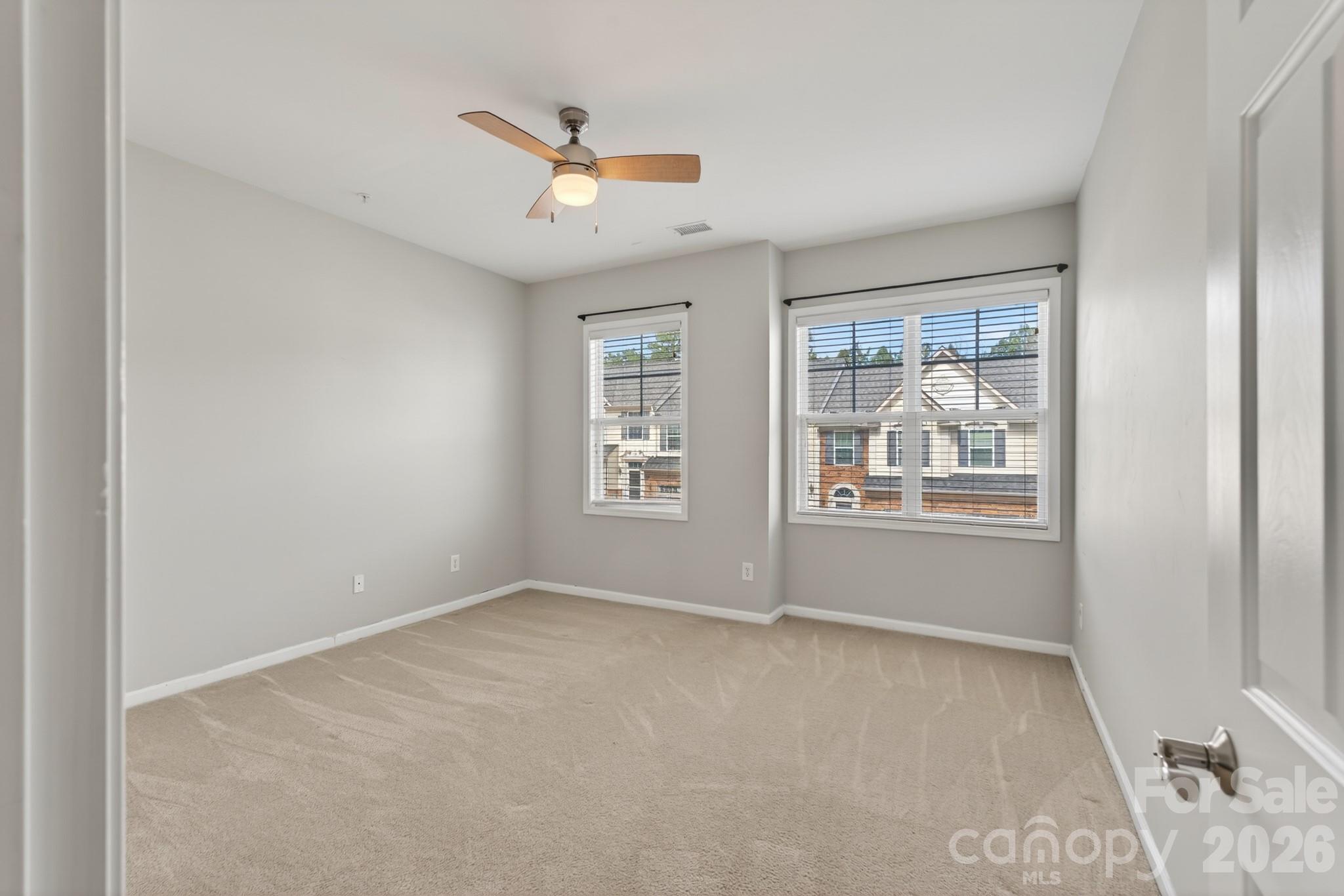 114 Inlet Point Drive Tega Cay, SC 29708 - Photo 24 of 40 an empty room with windows