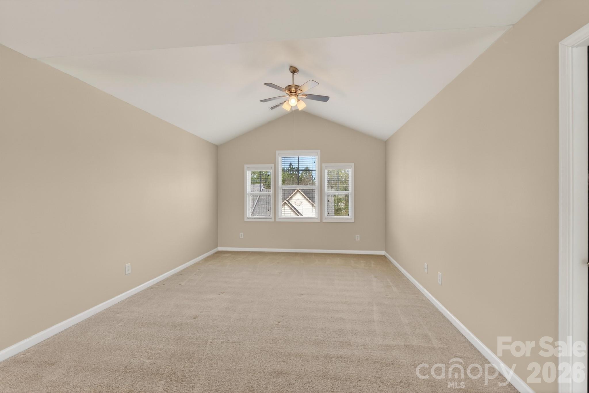 114 Inlet Point Drive Tega Cay, SC 29708 - Photo 32 of 40 an empty room with windows and fan