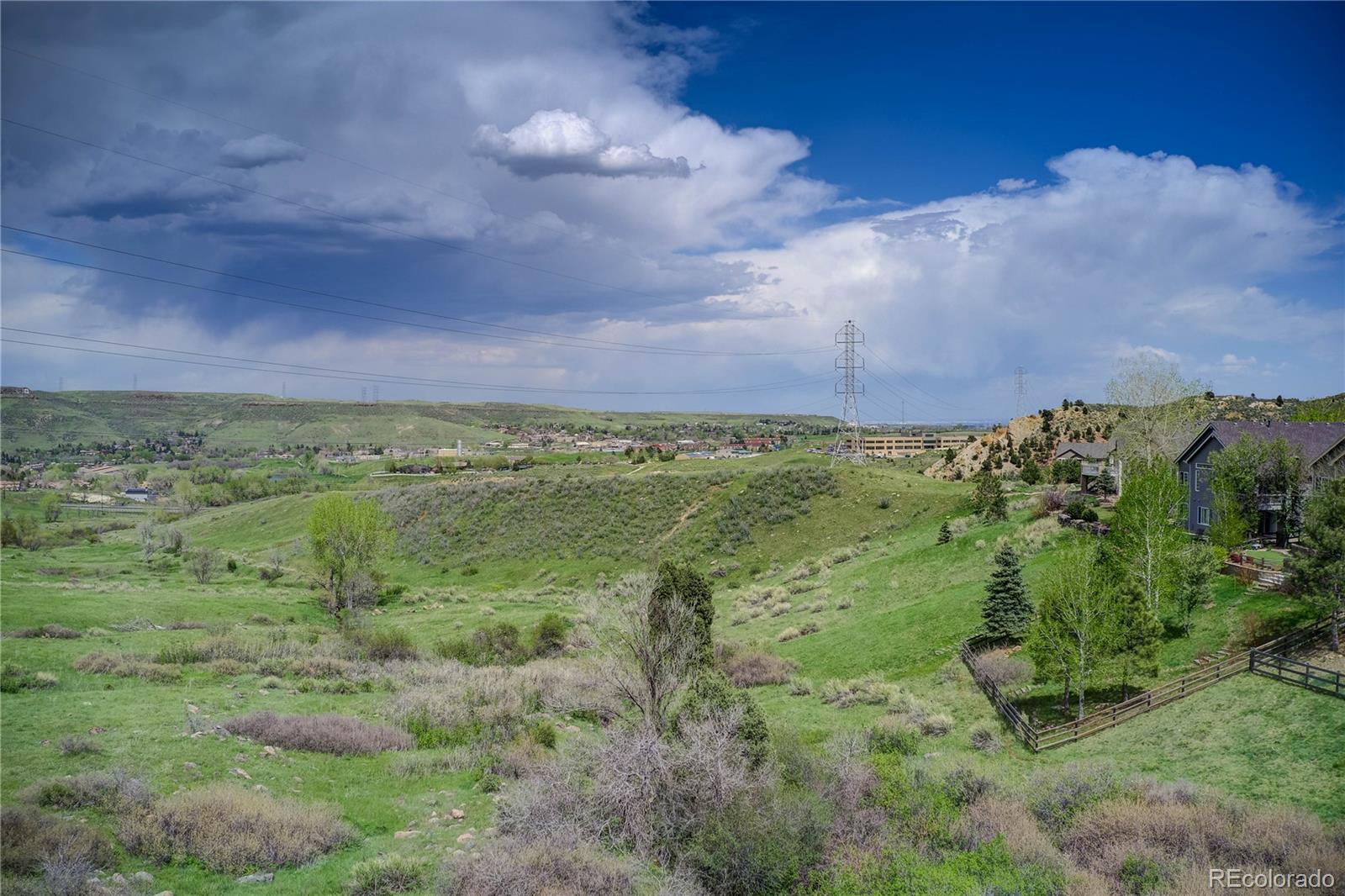 854 Shelton Road Golden, CO 80401 - Photo 17 of 31 a view of a lush green field