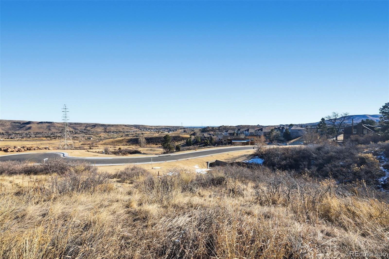 854 Shelton Road Golden, CO 80401 - Photo 6 of 20 a view of a dry yard and mountain