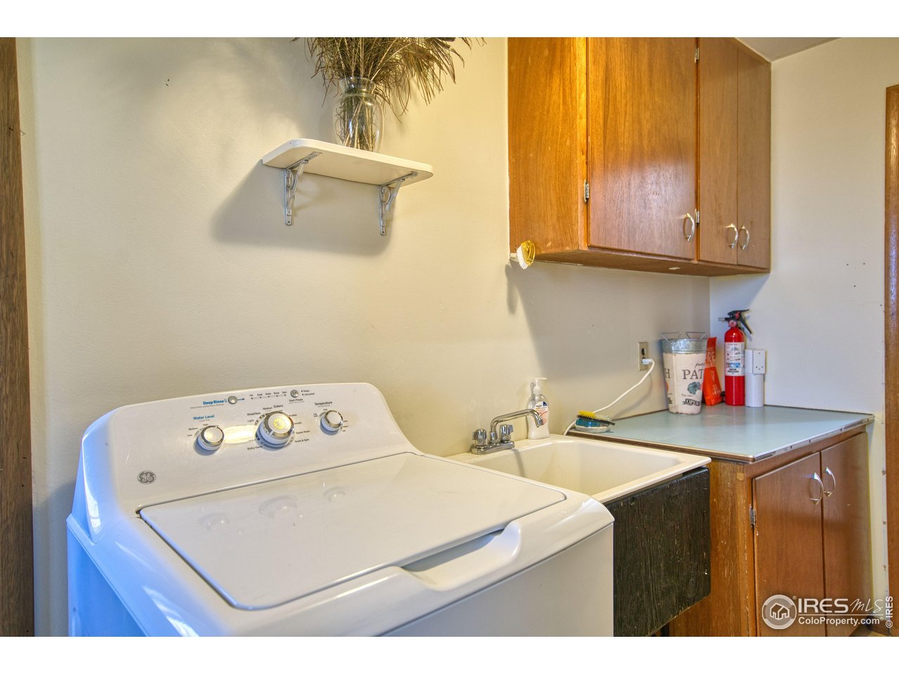 2148 North 75th Street Boulder, CO 80301 - Photo 16 of 41 a utility room with a sink washer and dryer