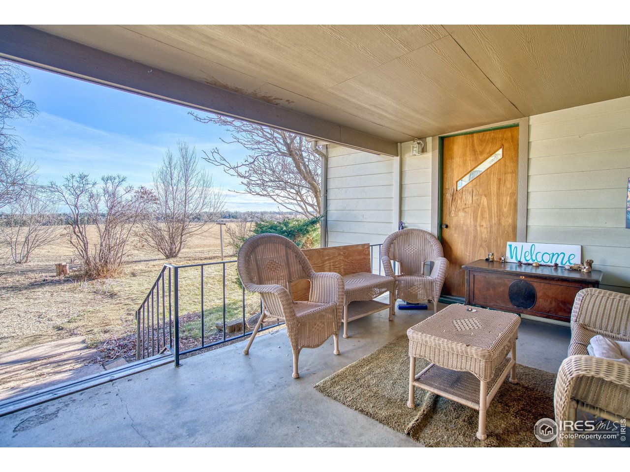 2148 North 75th Street Boulder, CO 80301 - Photo 20 of 41 a living room with furniture and a floor to ceiling window