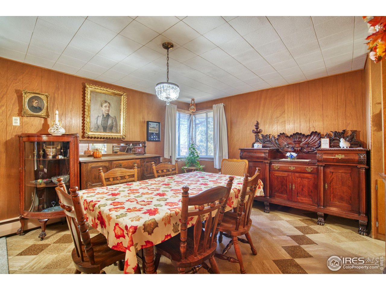 2148 North 75th Street Boulder, CO 80301 - Photo 6 of 41 a view of a dining room with furniture window and wooden floor