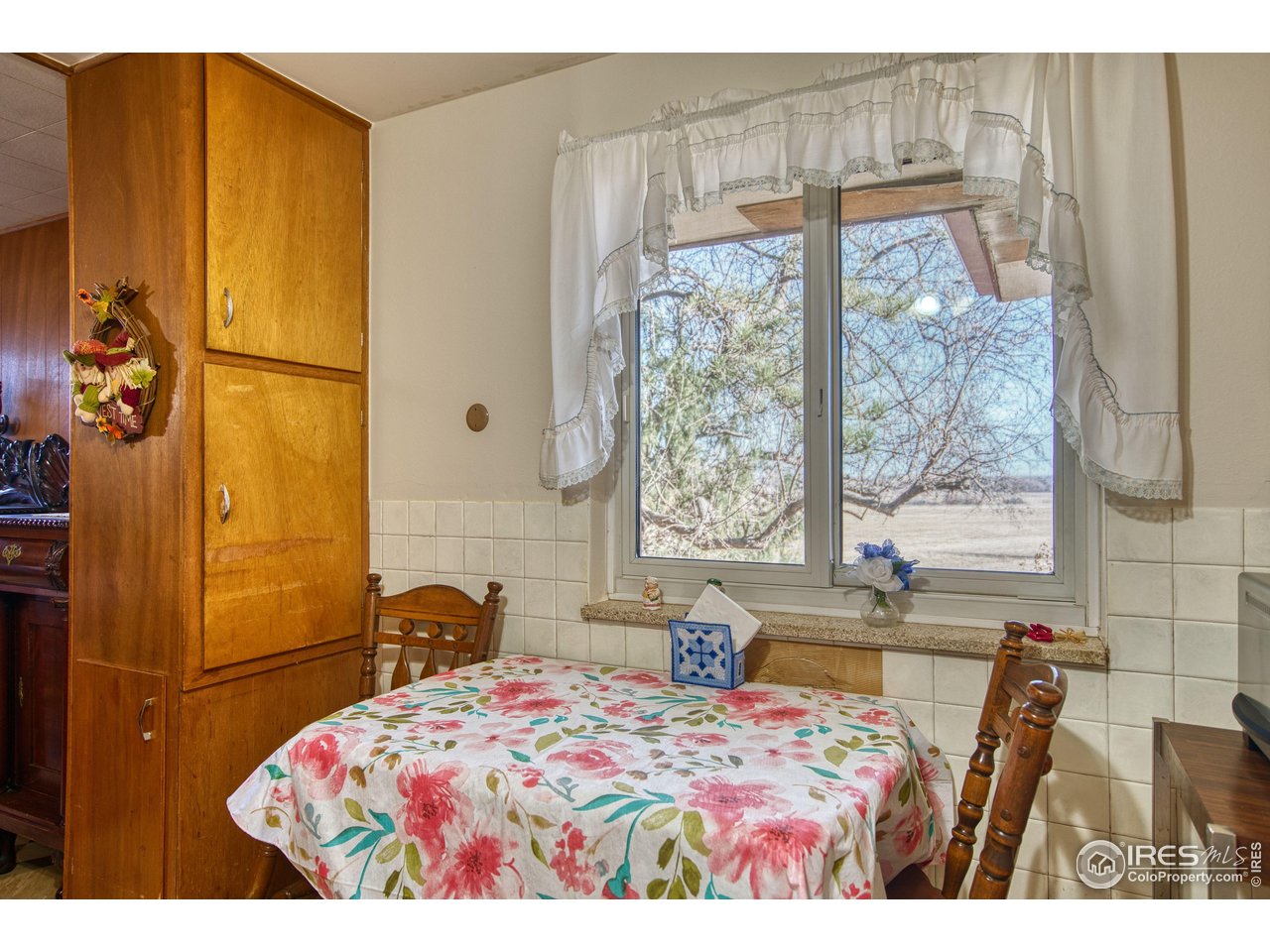 2148 North 75th Street Boulder, CO 80301 - Photo 10 of 41 a bedroom with a bed dresser and a window