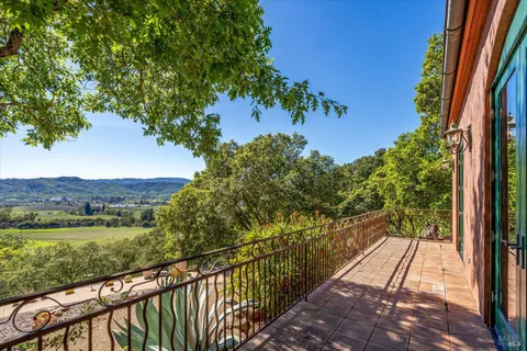 a view of a balcony with lake view