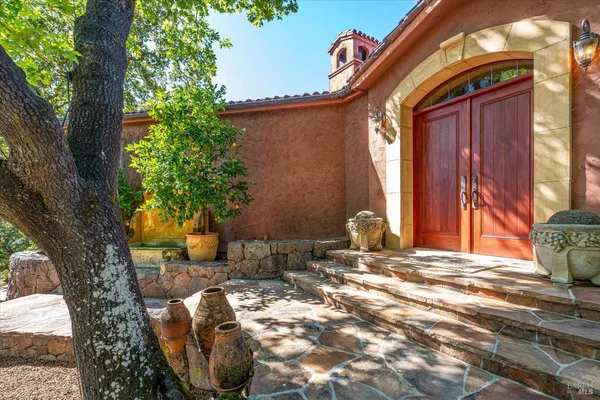 a view of a backyard of the house