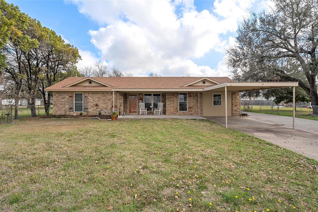 1038 South Old Robinson Road Robinson, TX 76706 - Photo 1 of 36 Ranch-style home featuring a carport, covered porch, brick siding, and driveway