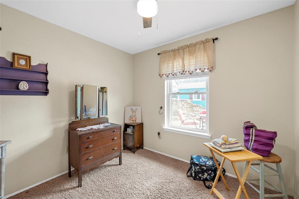 1038 South Old Robinson Road Robinson, TX 76706 - Photo 17 of 36 Office area featuring light colored carpet and baseboards