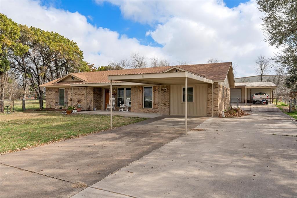 1038 South Old Robinson Road Robinson, TX 76706 - Photo 2 of 36 Ranch-style home with a carport, driveway, brick siding, and a gate