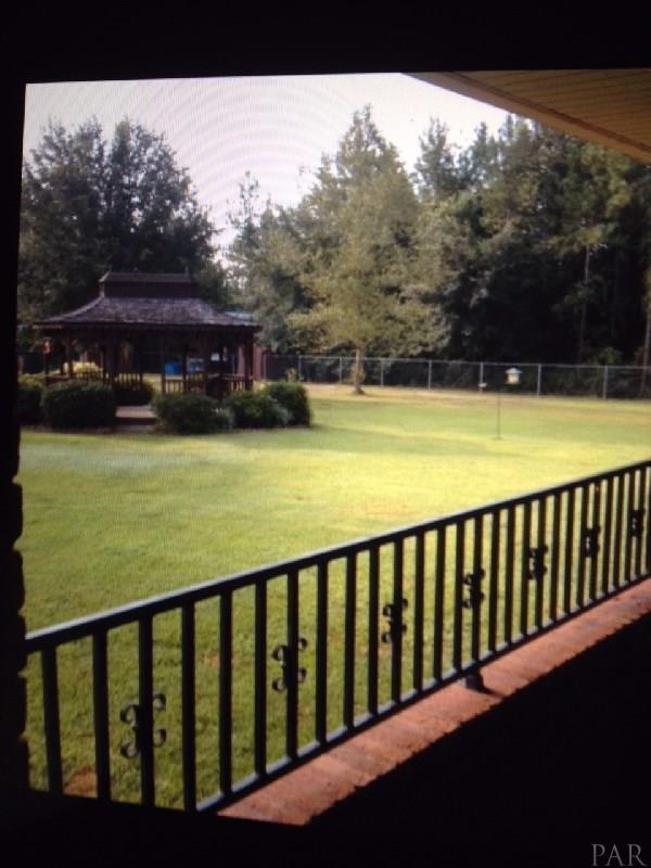 2617 Segrest Road Pace, FL 32571 - Photo 29 of 34 Rear Yard with Gazebo