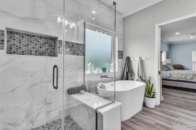 a bathroom with a bathtub and a sink