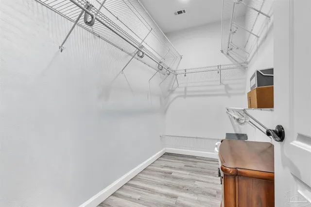 a view of a room with racks on the wall