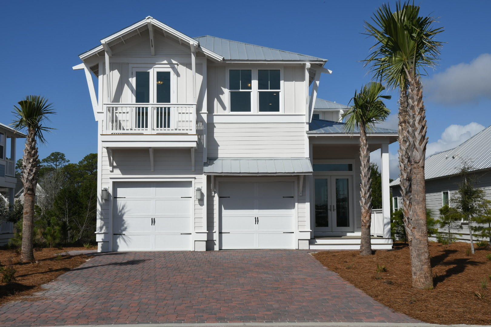 50 Prominence Square Inlet Beach Inlet Beach, FL 32461 - Photo 1 of 16 a front view of a house with a yard and garage