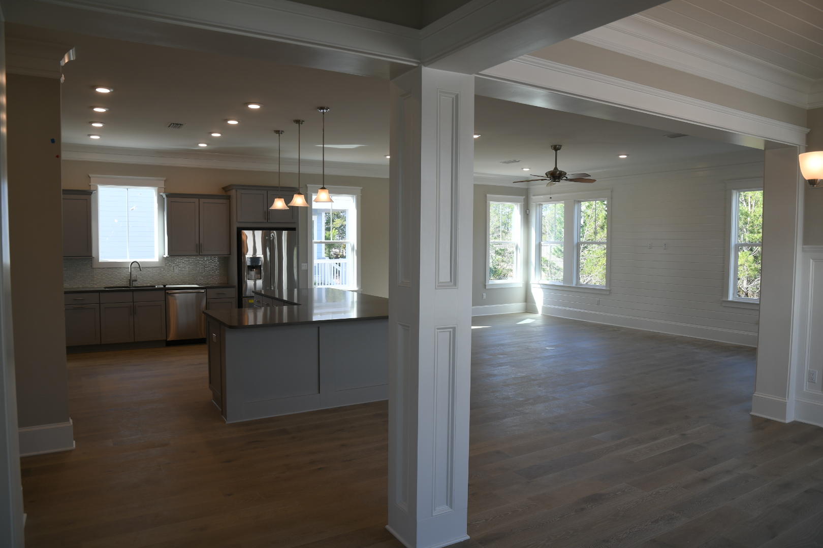 50 Prominence Square Inlet Beach Inlet Beach, FL 32461 - Photo 5 of 16 an empty room with wooden floor and windows