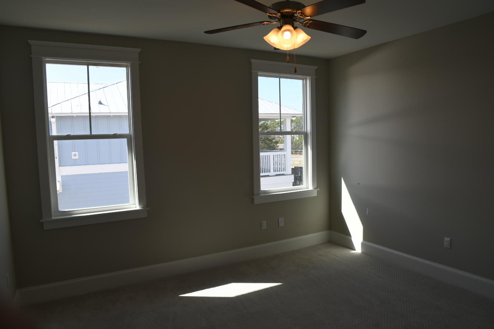 50 Prominence Square Inlet Beach Inlet Beach, FL 32461 - Photo 8 of 16 an empty room with windows and fan