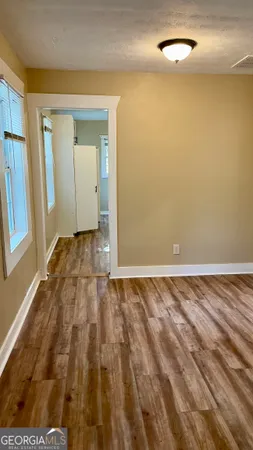a view of an empty room and window