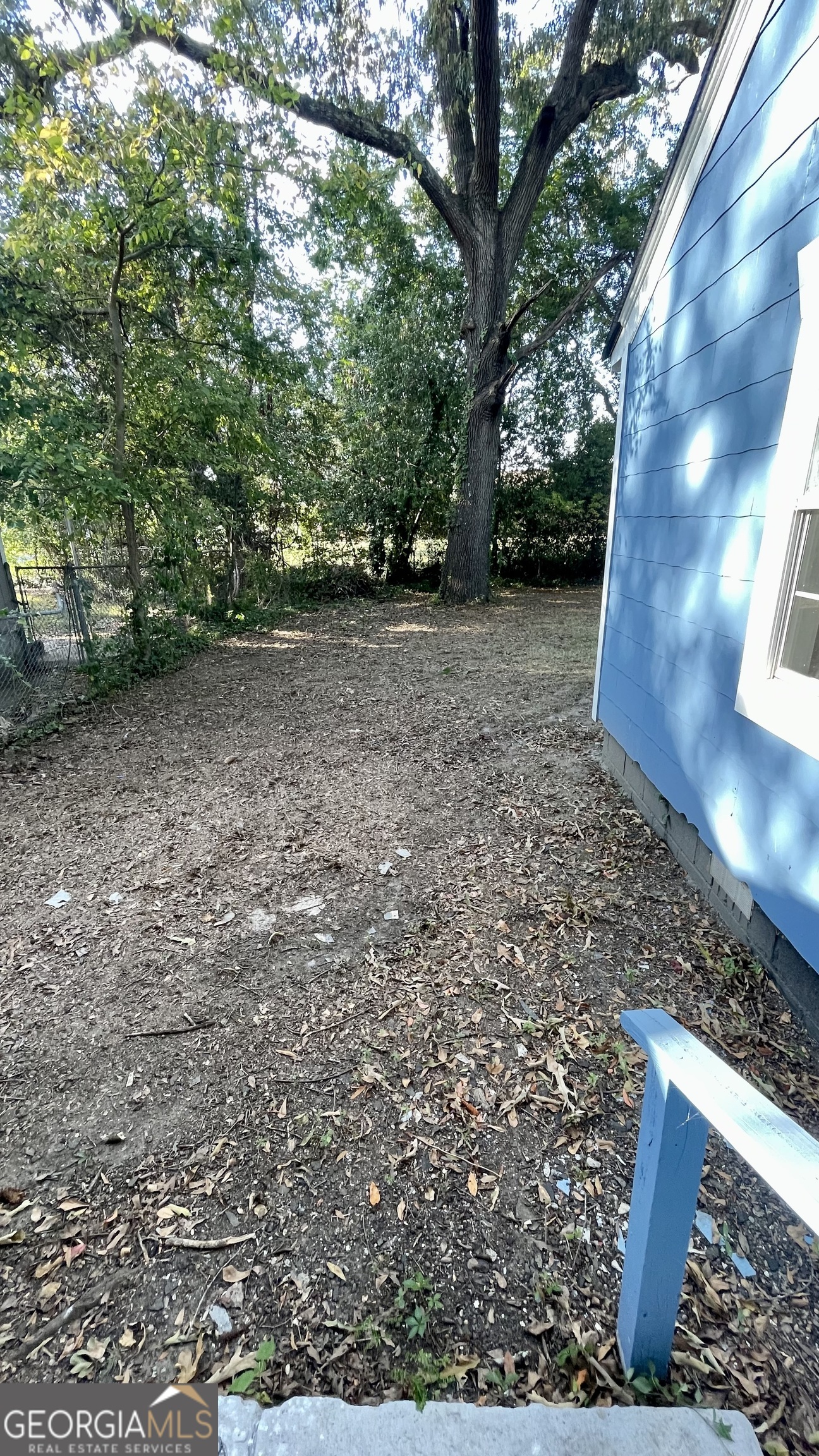 611 West Moore Street Dublin, GA 31021 - Photo 3 of 15 a view of outdoor space with deck and yard