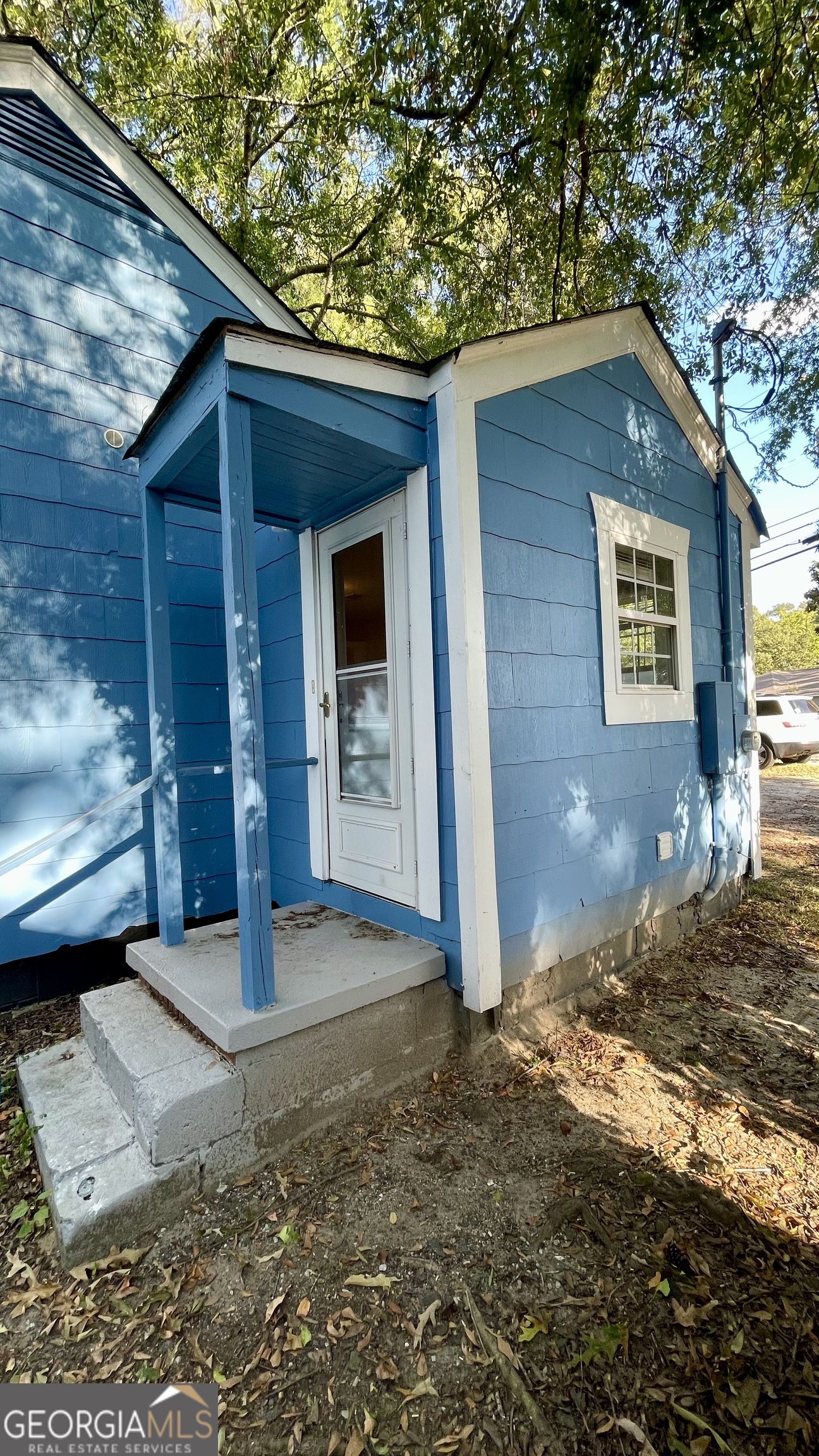 611 West Moore Street Dublin, GA 31021 - Photo 5 of 15 a view of a house with a yard