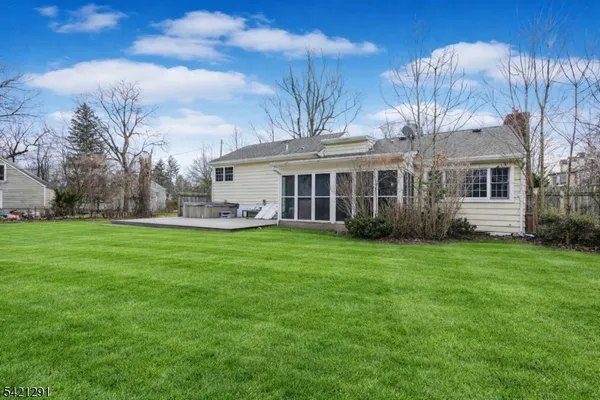 a bedroom with furniture and window