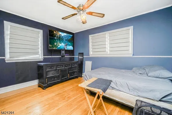 a bedroom with a bed and a cabinets