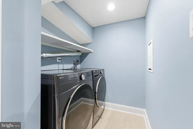 a house that has a tree in front of it