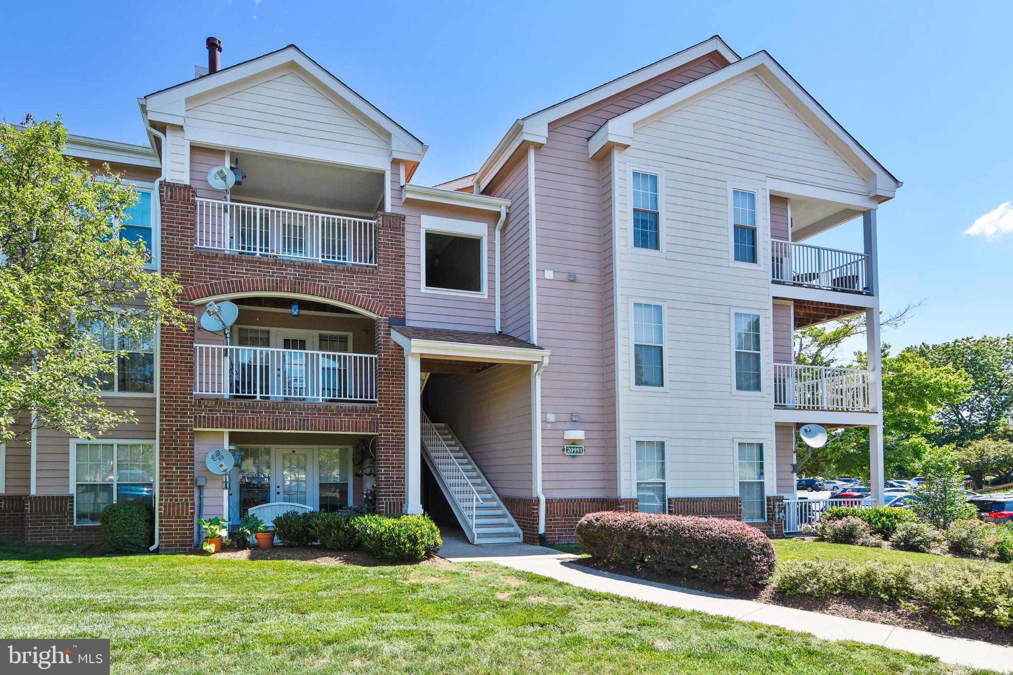 20991 Timber Ridge Terrace, Unit 204 Ashburn, VA 20147 - Photo 11 of 52 Front Elevation