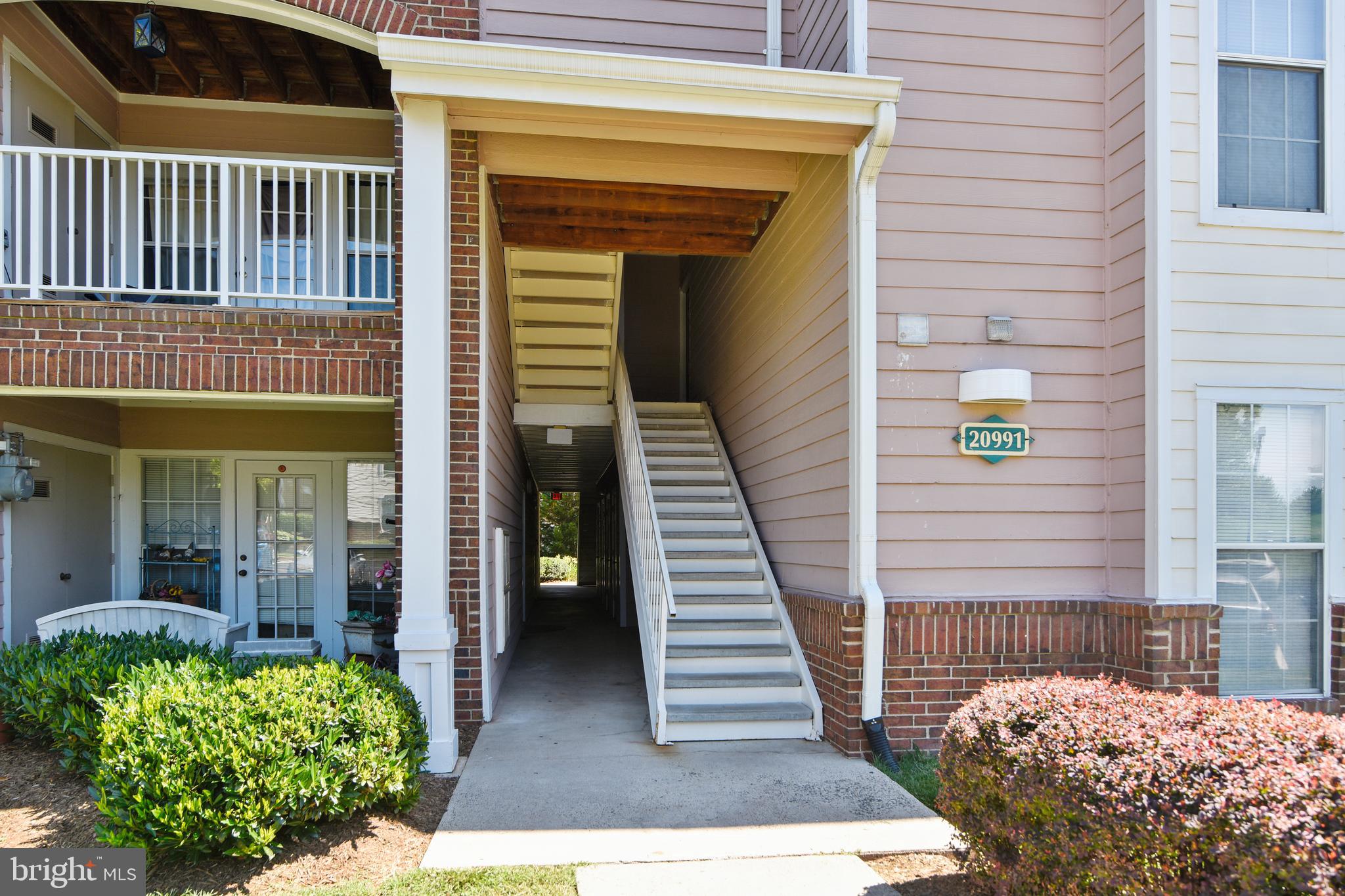 20991 Timber Ridge Terrace, Unit 204 Ashburn, VA 20147 - Photo 14 of 52 Walkway and Sairs