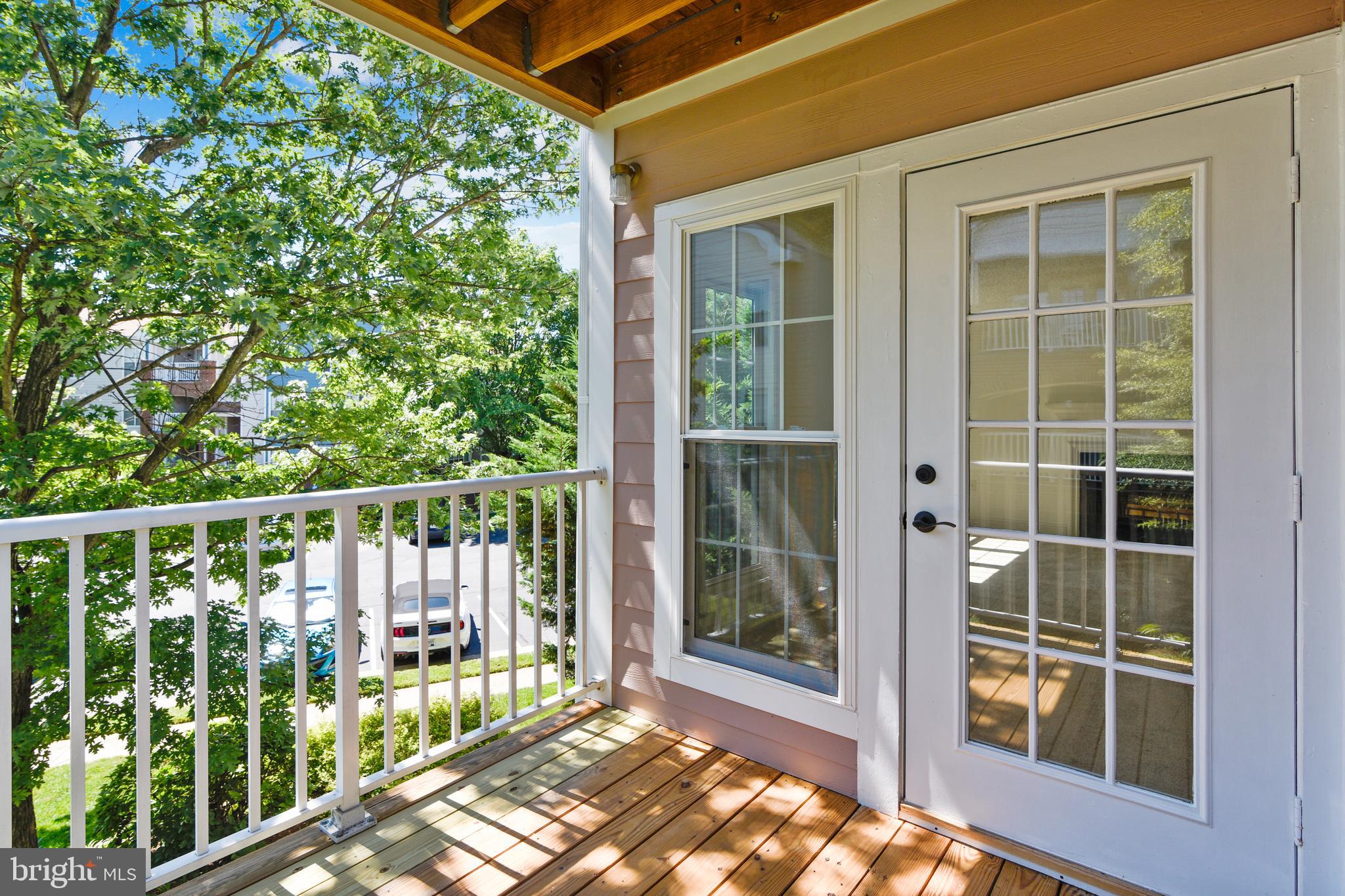 20991 Timber Ridge Terrace, Unit 204 Ashburn, VA 20147 - Photo 16 of 52 View From The Balcony Off The Dining Room