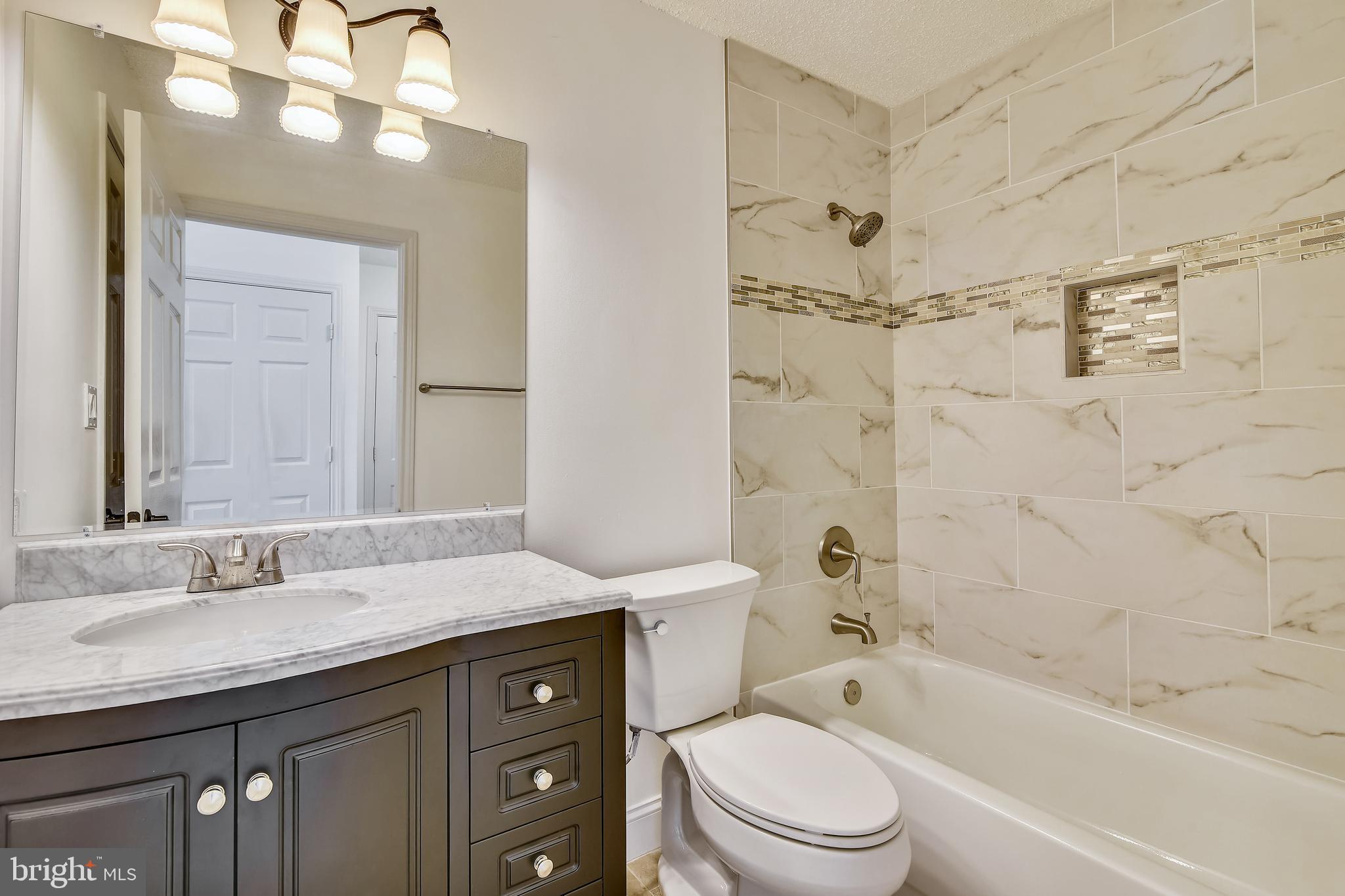 20991 Timber Ridge Terrace, Unit 204 Ashburn, VA 20147 - Photo 18 of 52 Bathroom 2