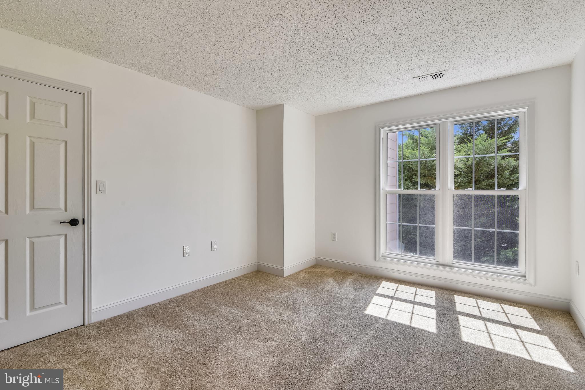20991 Timber Ridge Terrace, Unit 204 Ashburn, VA 20147 - Photo 21 of 52 Bedroom 2
