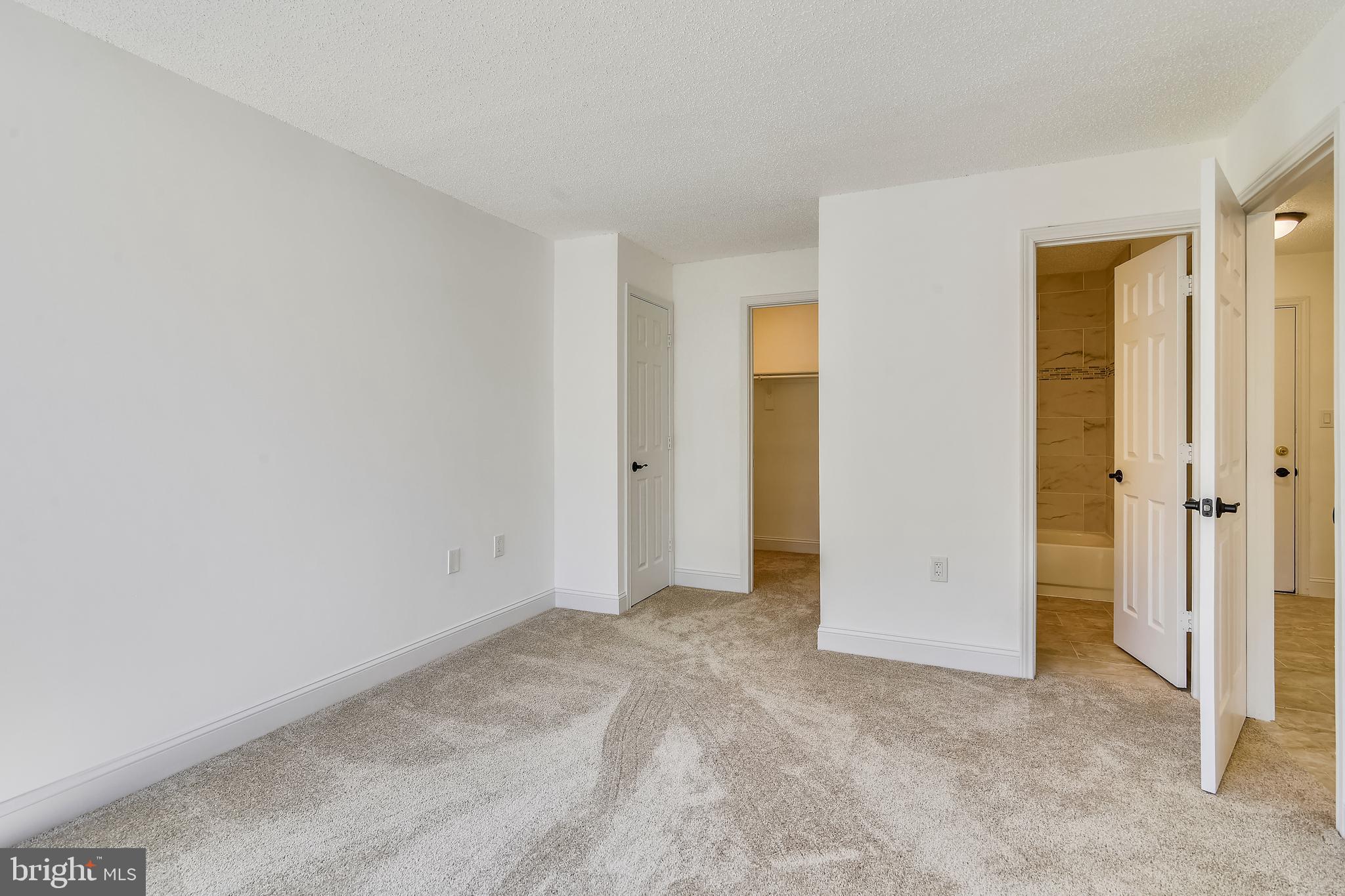 20991 Timber Ridge Terrace, Unit 204 Ashburn, VA 20147 - Photo 23 of 52 Bedroom 2