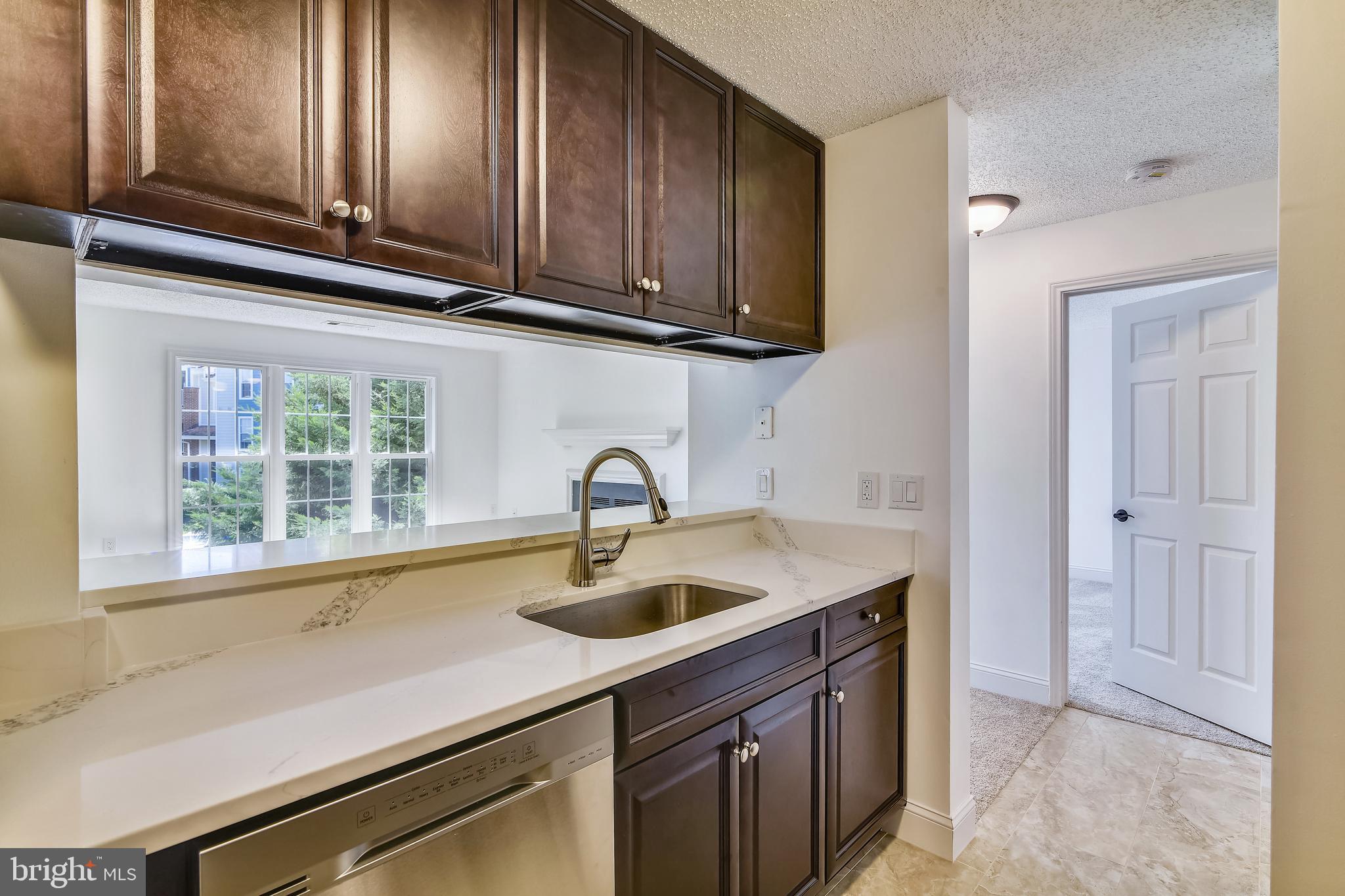 20991 Timber Ridge Terrace, Unit 204 Ashburn, VA 20147 - Photo 29 of 52 Sink and Energy Star Dishwasher