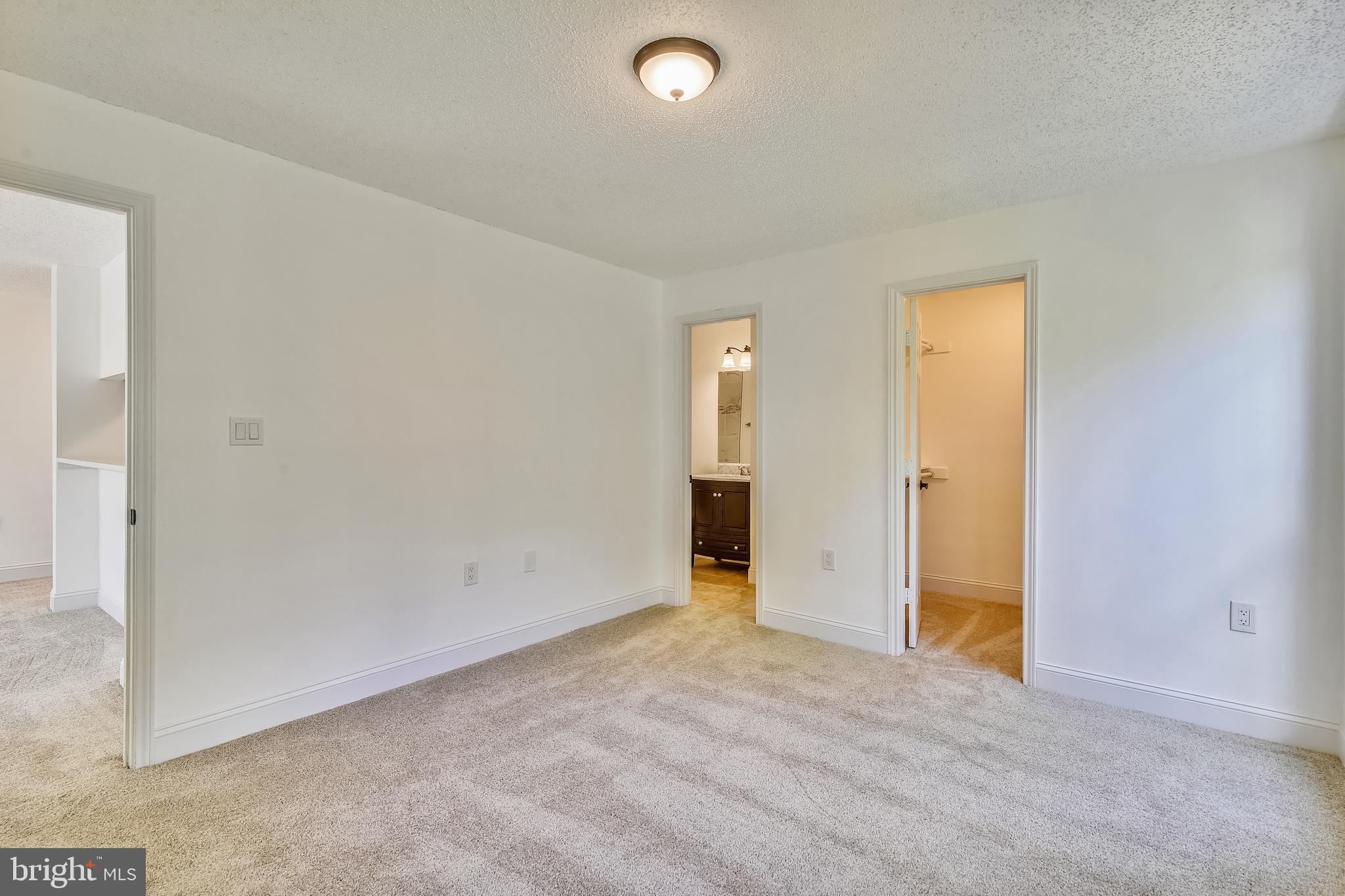 20991 Timber Ridge Terrace, Unit 204 Ashburn, VA 20147 - Photo 41 of 52 Master Bedroom