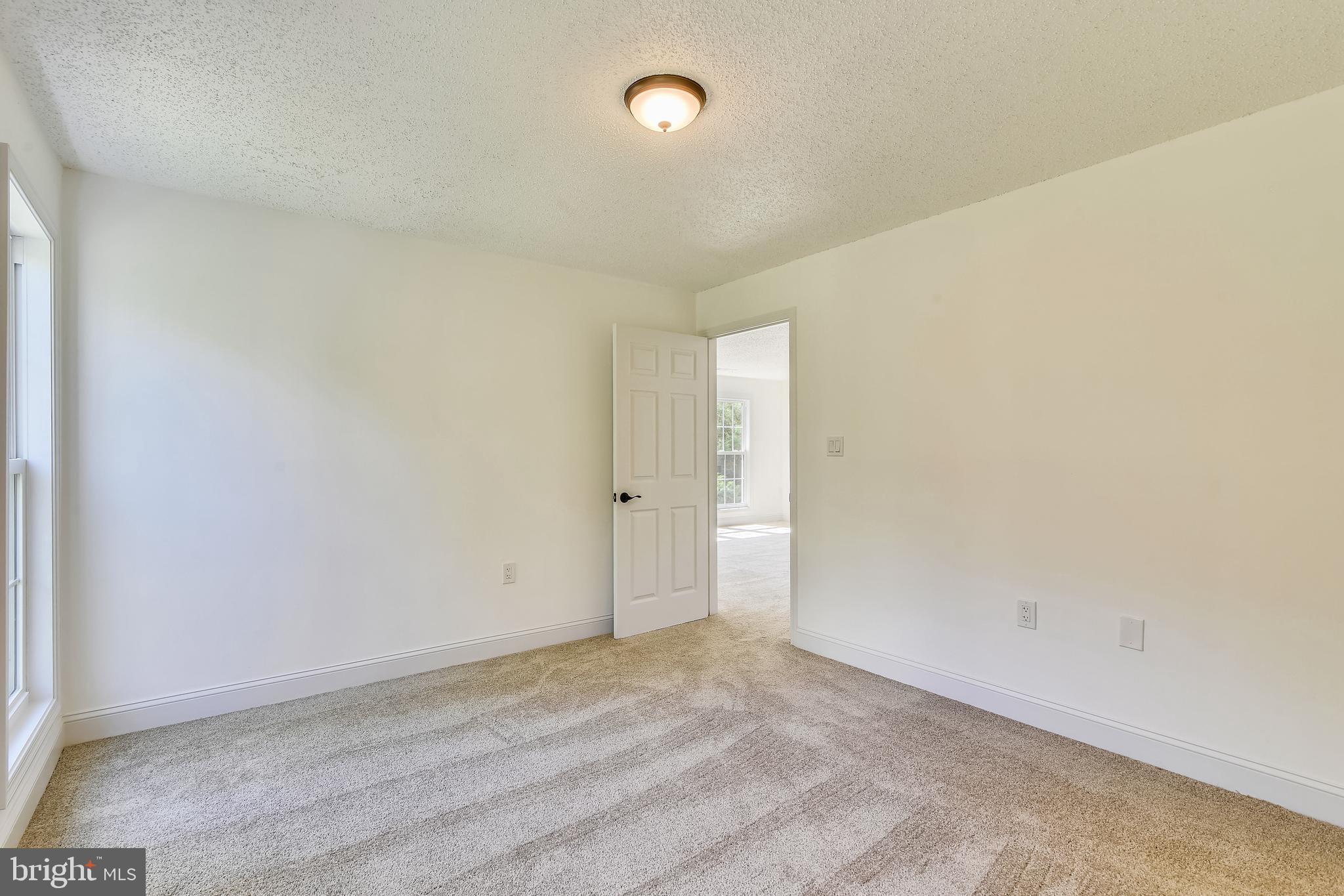 20991 Timber Ridge Terrace, Unit 204 Ashburn, VA 20147 - Photo 42 of 52 Master Bedroom