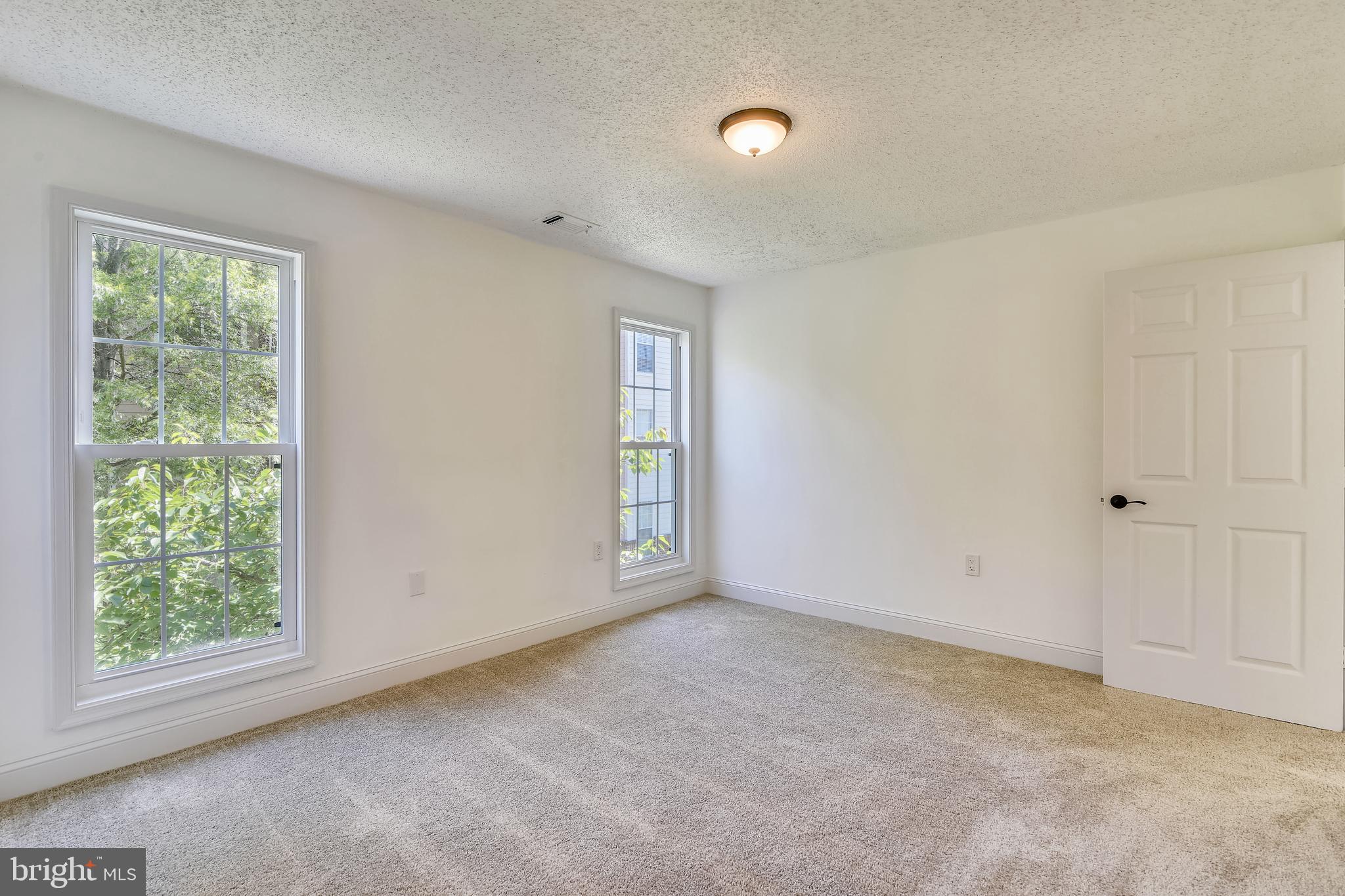 20991 Timber Ridge Terrace, Unit 204 Ashburn, VA 20147 - Photo 43 of 52 Master Bedroom