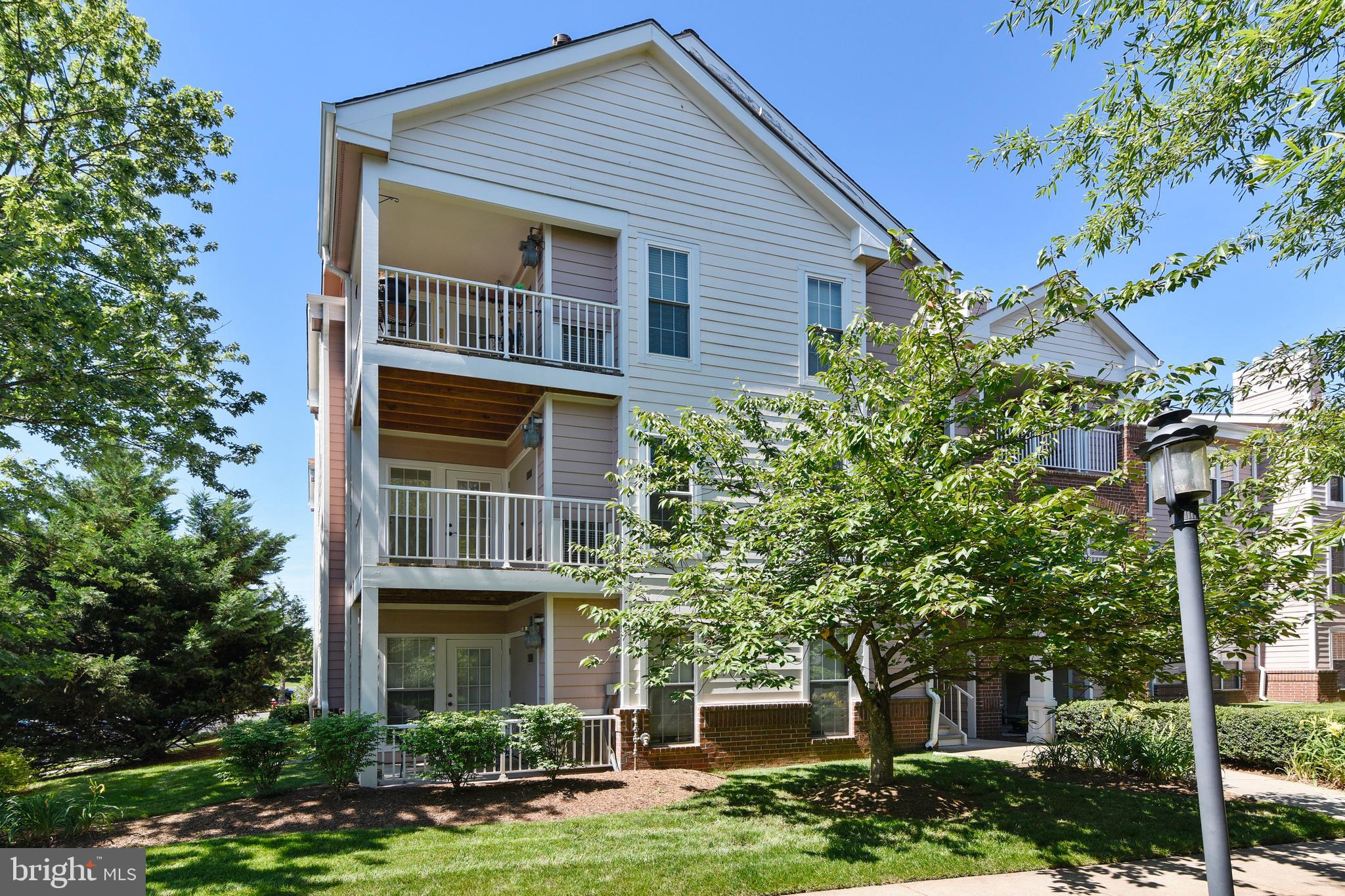 20991 Timber Ridge Terrace, Unit 204 Ashburn, VA 20147 - Photo 8 of 52 Back Elevation