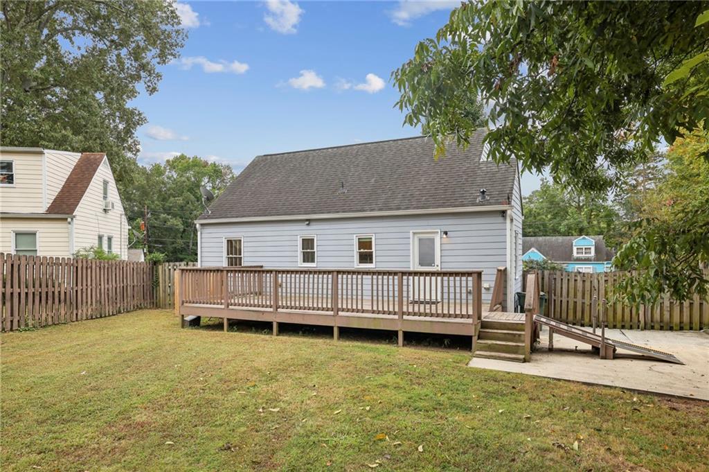 1952 Wingate Road Chamblee, GA 30341 - Photo 20 of 23 a view of a house with a backyard and a chair