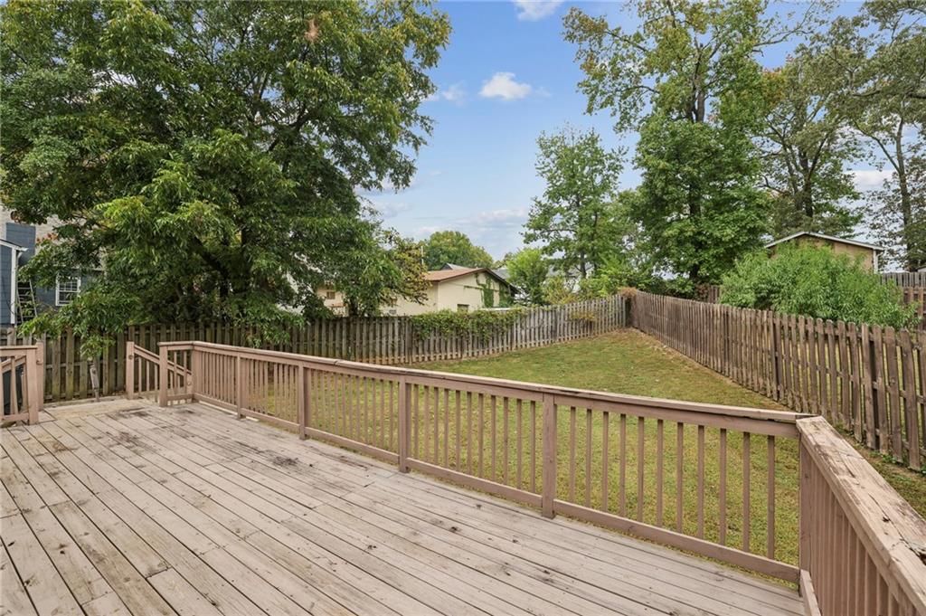 1952 Wingate Road Chamblee, GA 30341 - Photo 21 of 23 a view of balcony with wooden floor and fence