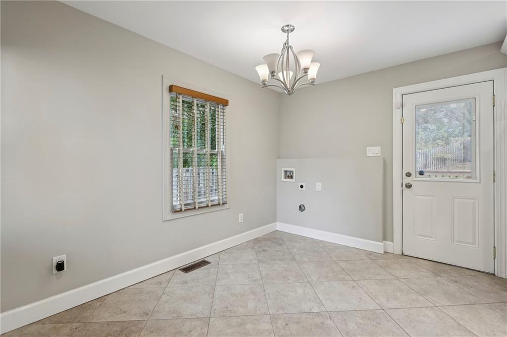 1952 Wingate Road Chamblee, GA 30341 - Photo 9 of 23 a view of an empty room with a window