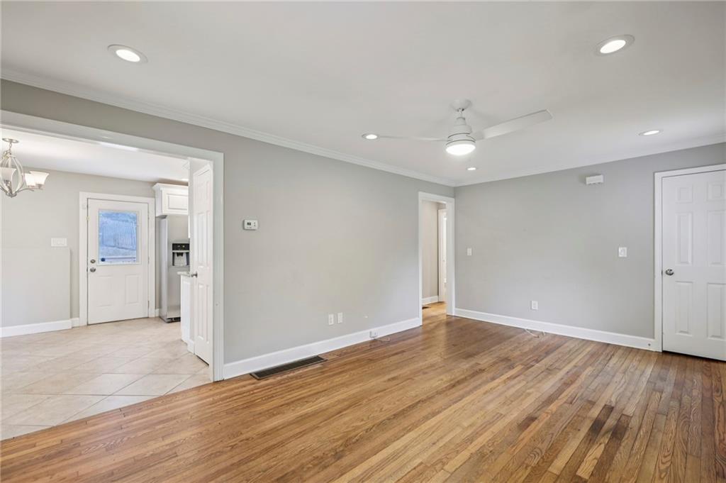 1952 Wingate Road Chamblee, GA 30341 - Photo 10 of 23 wooden floor in an empty room with wooden floor