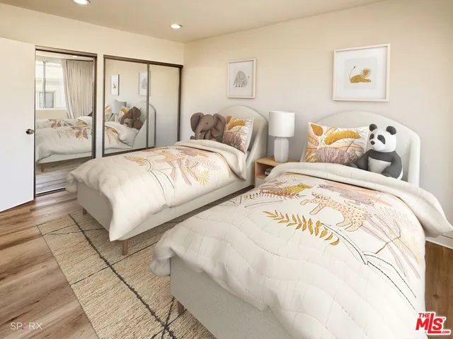 a large white bed in a white room