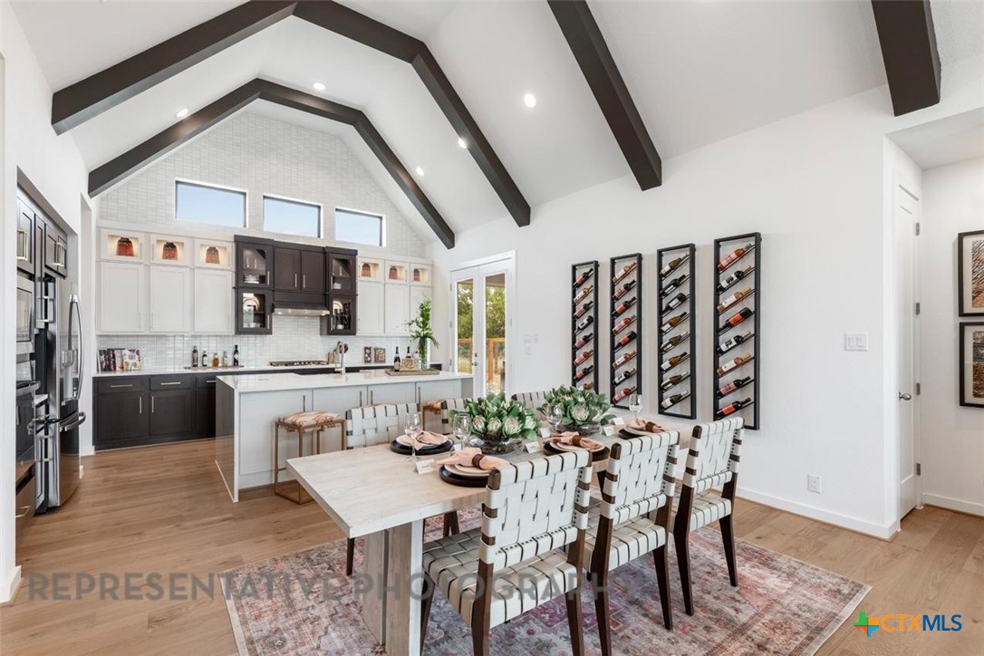 9501 Boathouse Drive Austin, TX 78744 - Photo 29 of 32 a view of a dining room with furniture