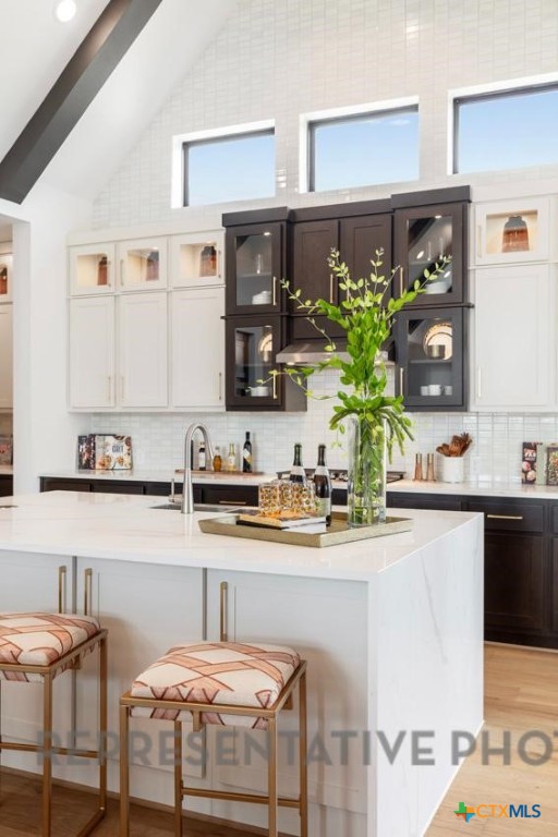 9501 Boathouse Drive Austin, TX 78744 - Photo 16 of 32 a kitchen with appliances a sink and cabinets