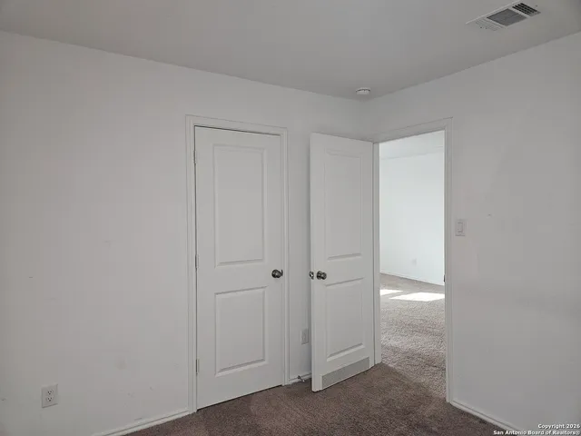 a bathroom with a toilet and a bathtub