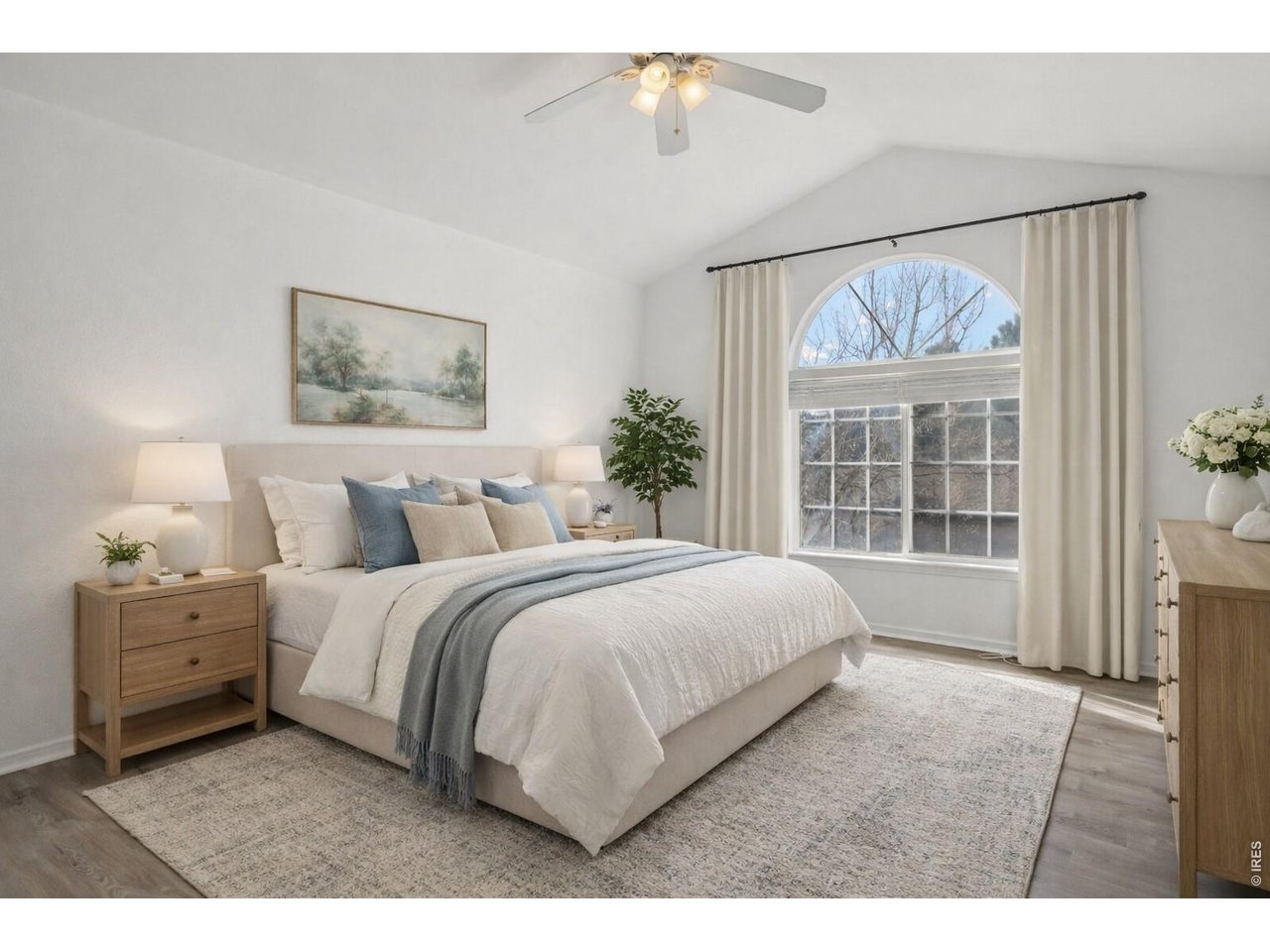 3002 West Elizabeth Street, Unit 16G Fort Collins, CO 80521 - Photo 15 of 29 a spacious bedroom with a large bed and a window