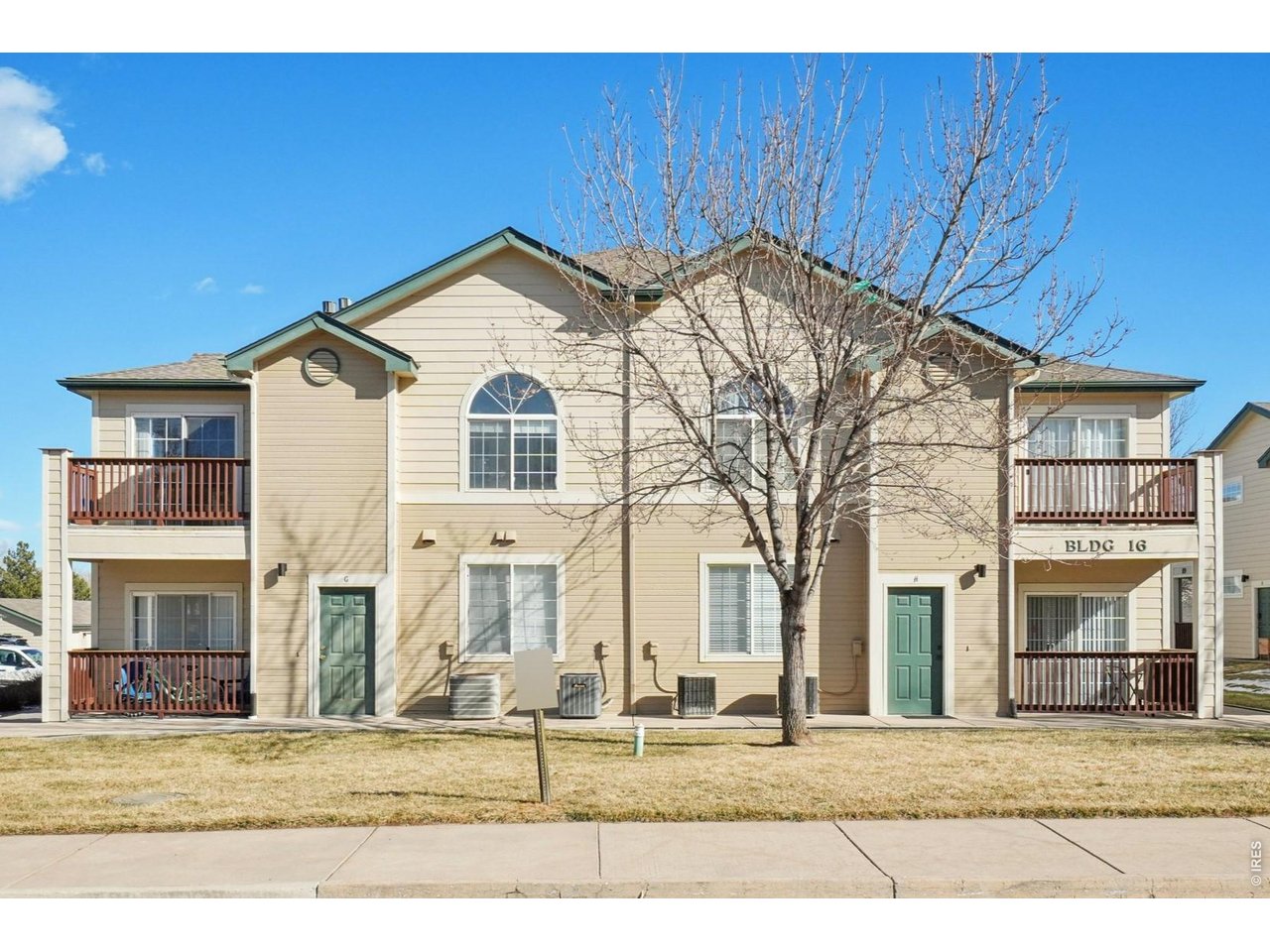3002 West Elizabeth Street, Unit 16G Fort Collins, CO 80521 - Photo 2 of 29 a view of a house with a yard