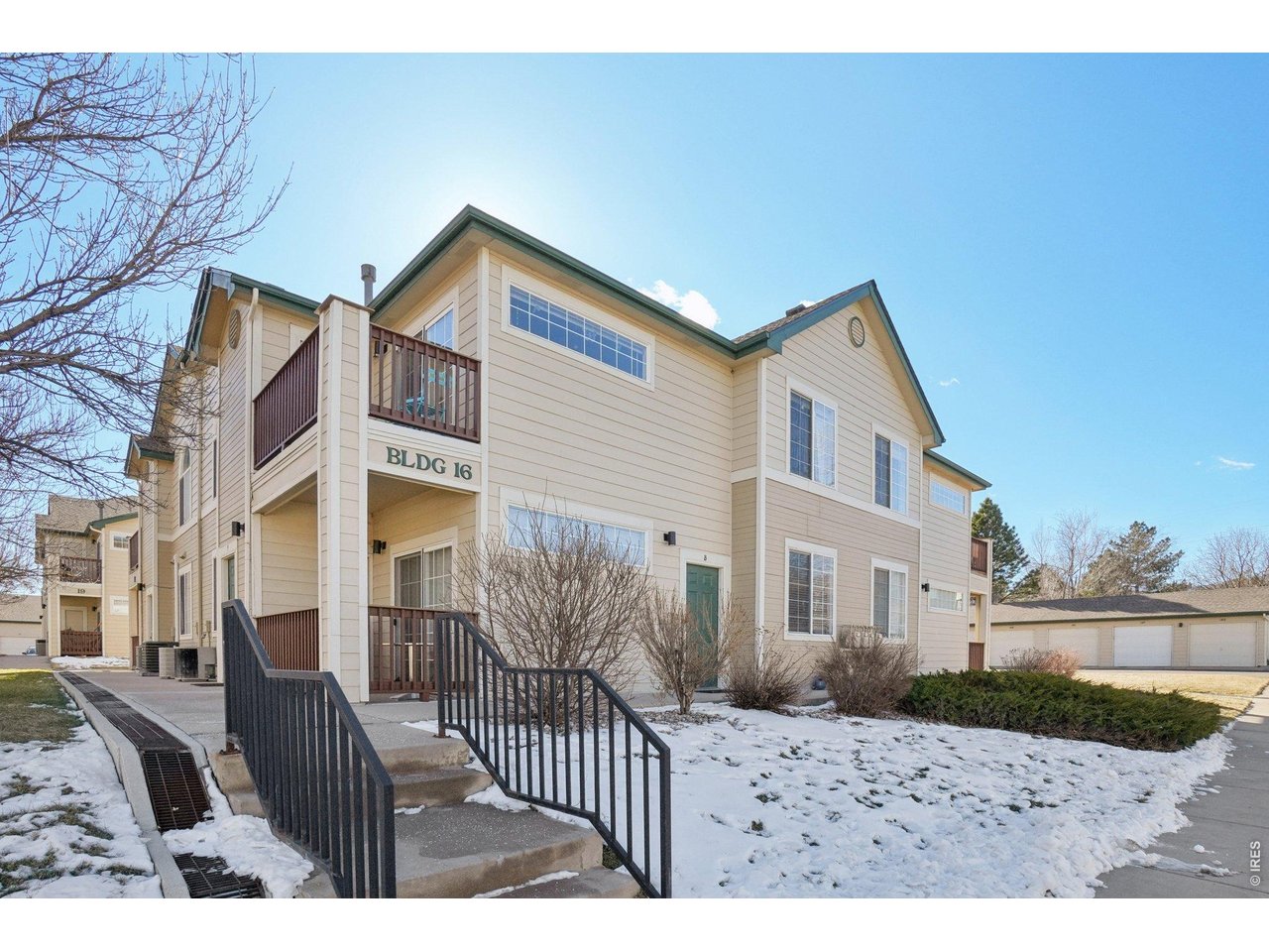3002 West Elizabeth Street, Unit 16G Fort Collins, CO 80521 - Photo 26 of 29 a view of a house with a yard