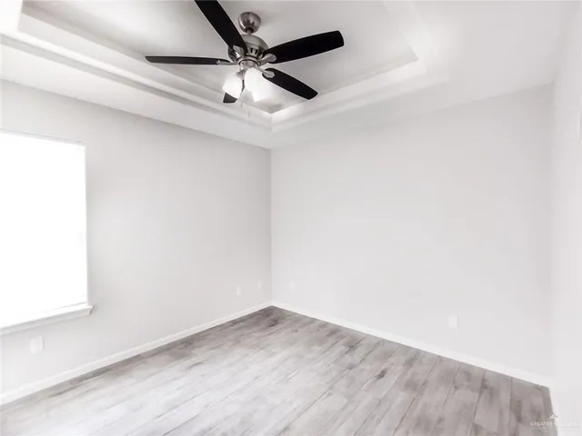 a view of a big room with wooden floor